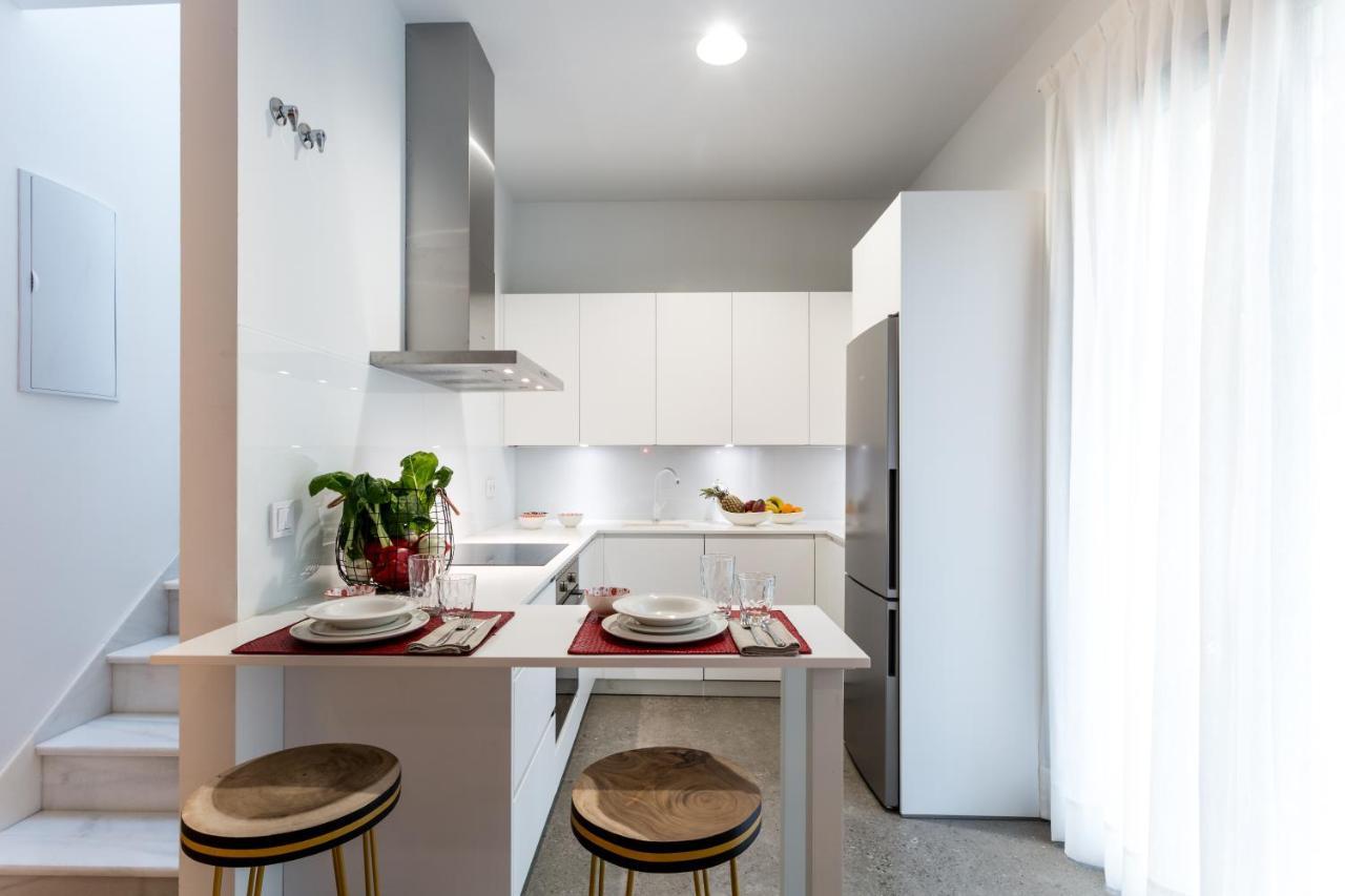 Apartamentos Rg Plaza De Espana เซบีญา ภายนอก รูปภาพ